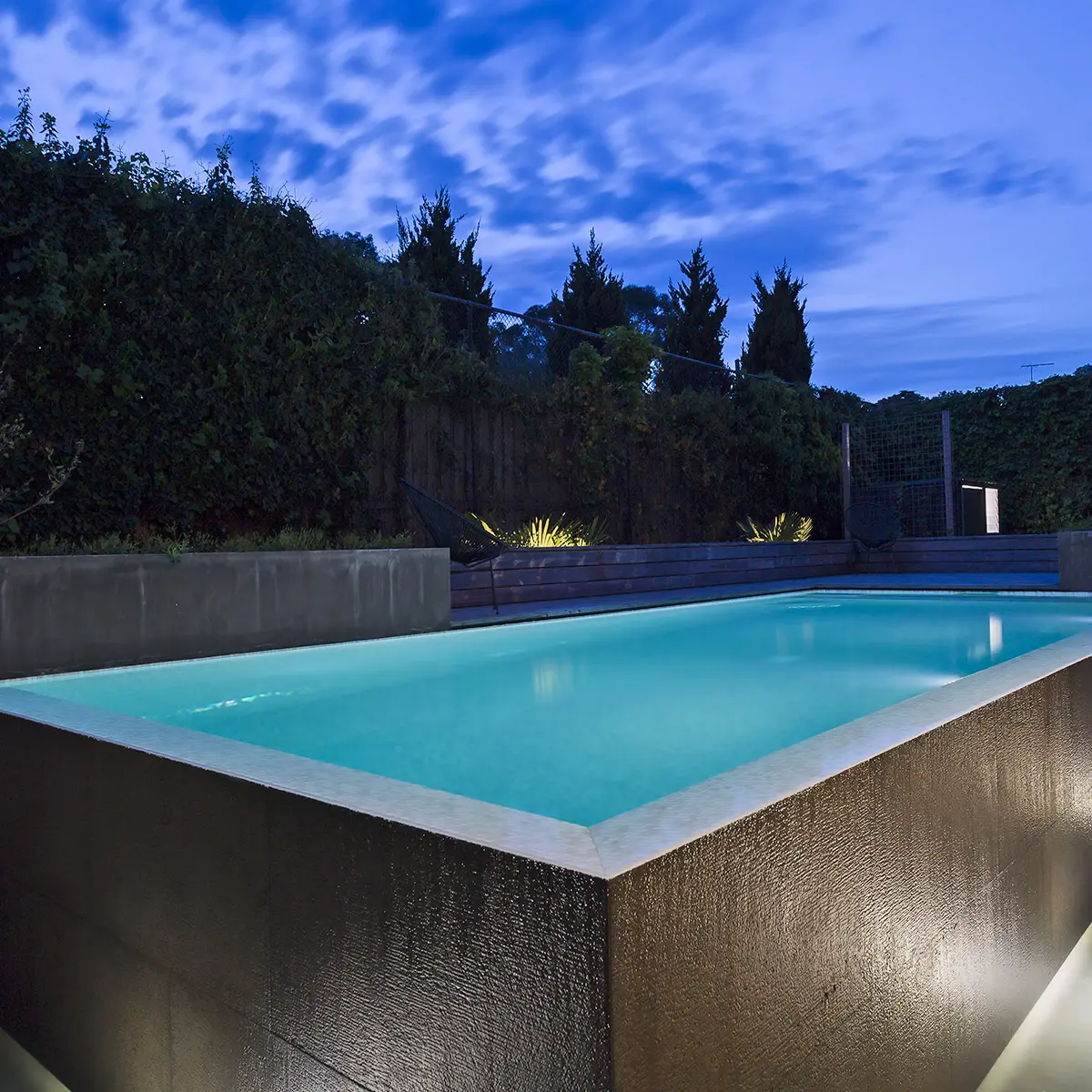 Swimming Pool Installed in Garden Area of Luxury Home